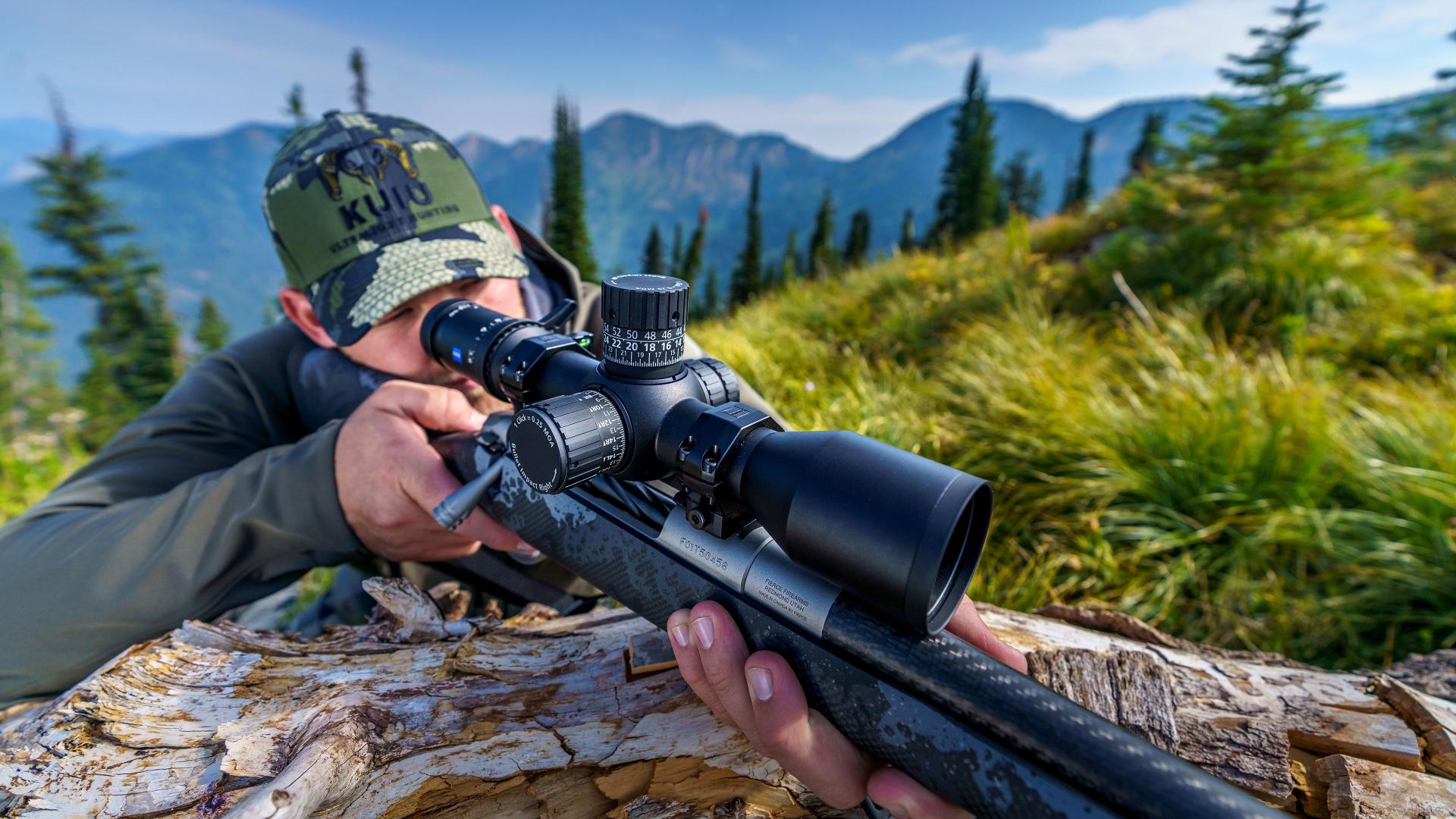 Hunter using ZEISS LRP S5 riflescope with premium optics, ensuring 90% light transmission for clear target identification