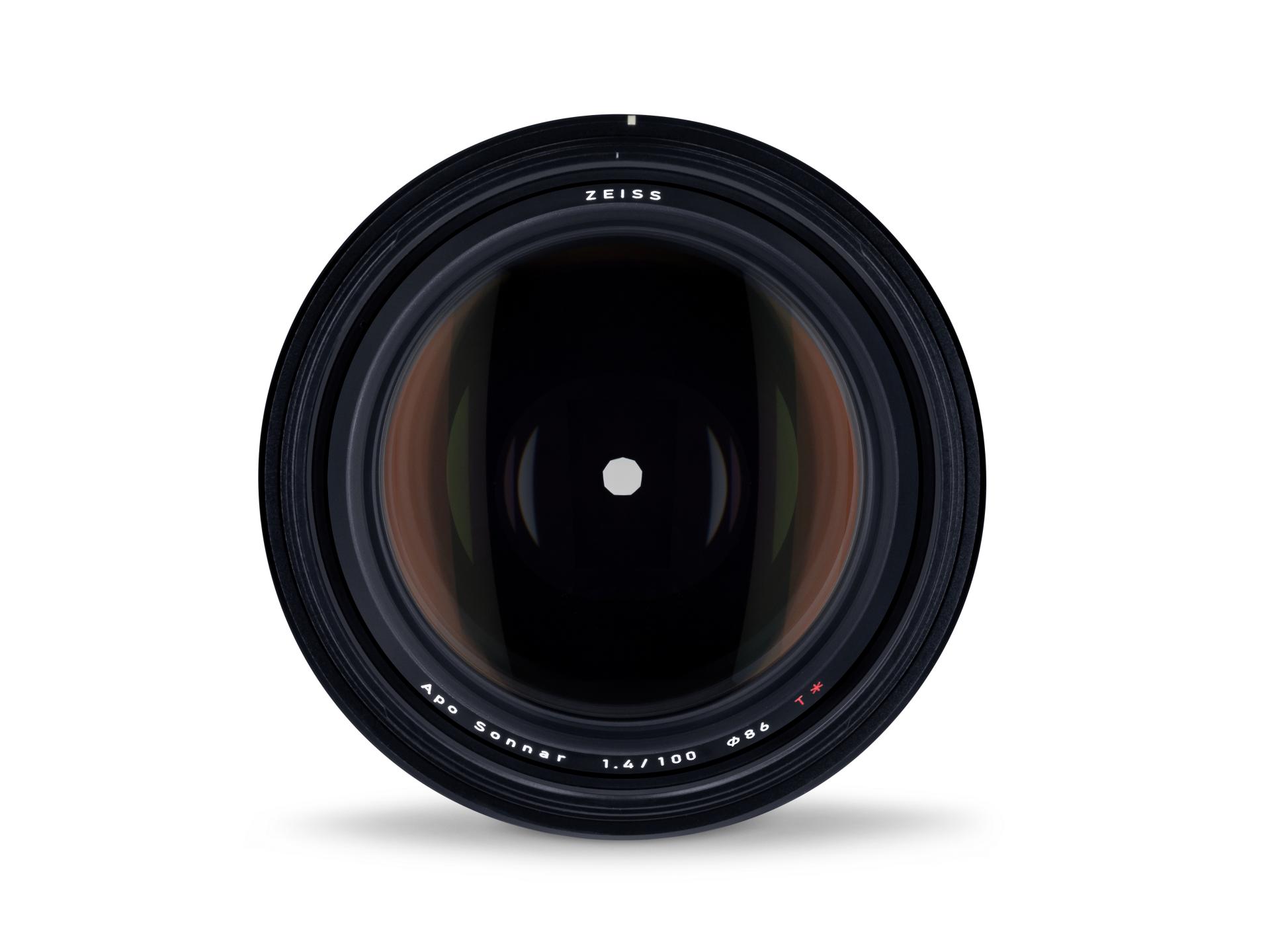 Front view of a ZEISS Apo Sonnar 1.4/100 camera lens showing the glass elements and lens markings.