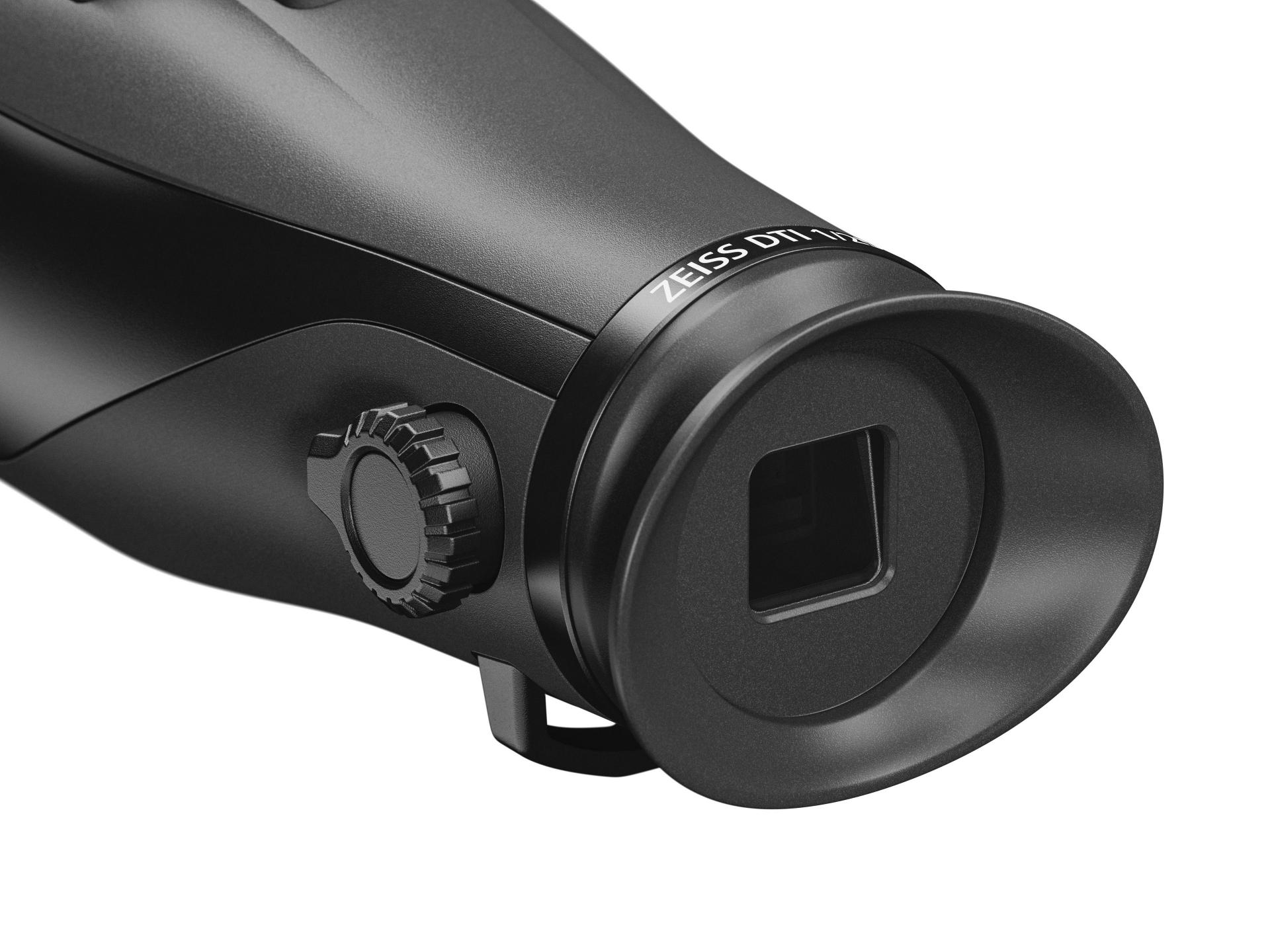 Close-up view of a black ZEISS DTI thermal imaging monocular showing the eyepiece, adjustment dial, and part of the device body.