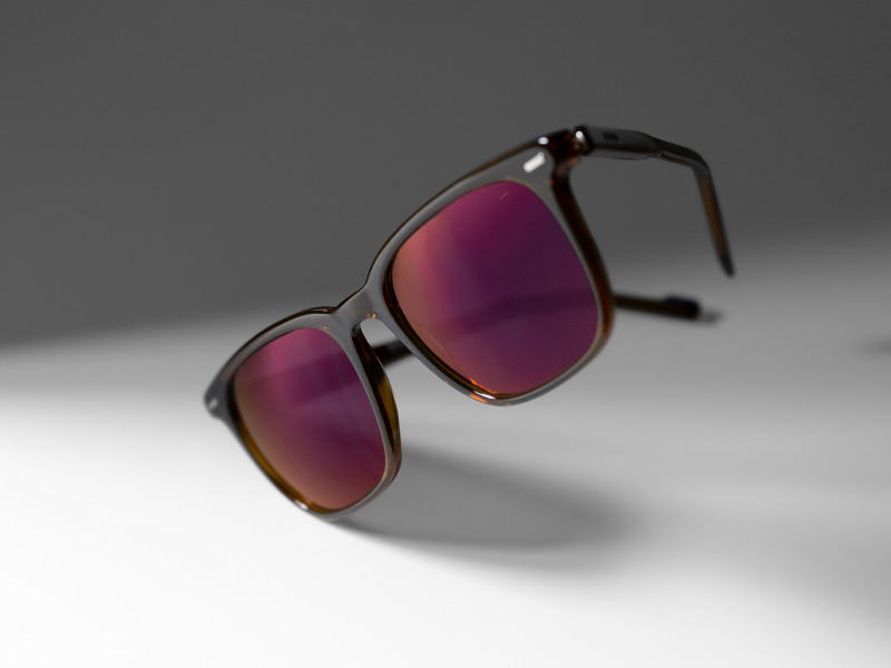 Trattamento ZEISS DuraVision Gold UV per lenti vista-sole color Burgundy.