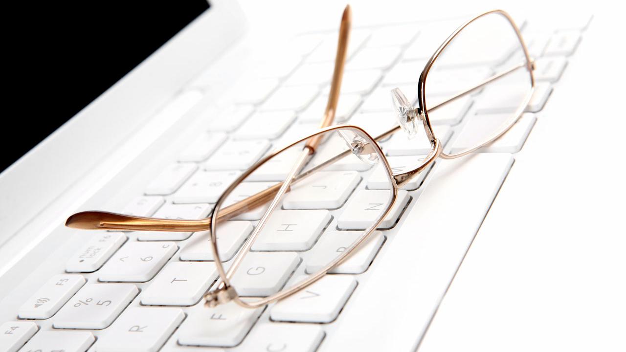 Spectacle lenses on computer keyboard