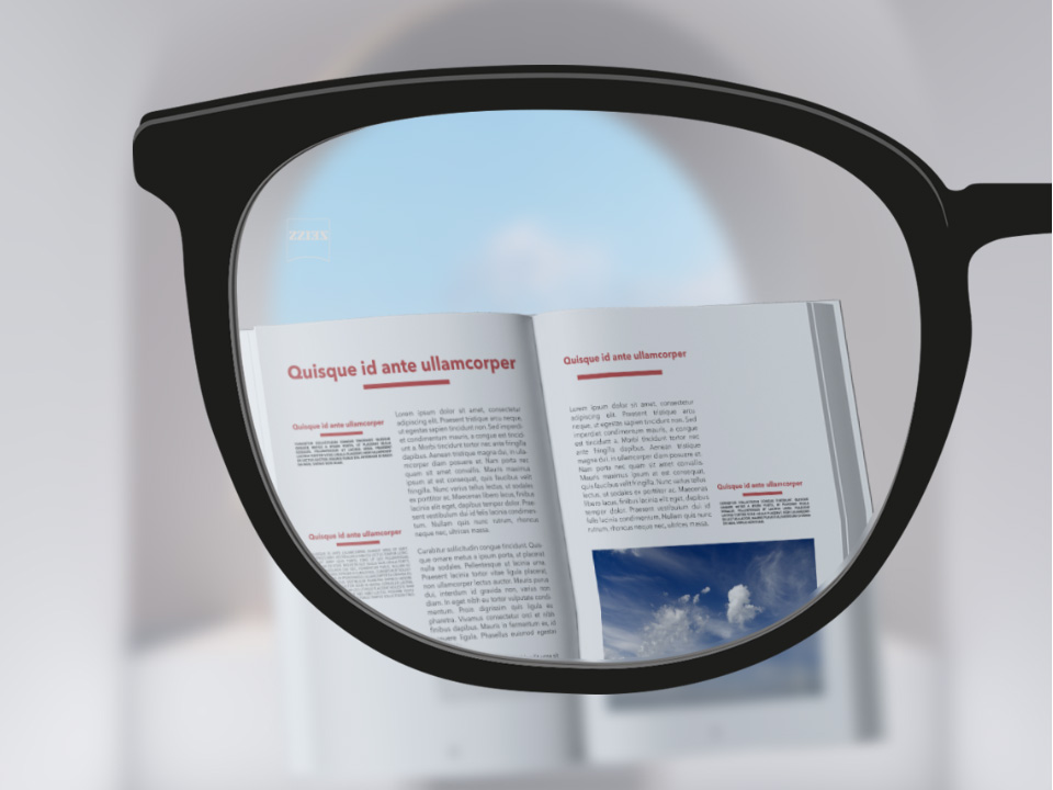  Immagine delle lenti  monofocali ZEISS ClearView, con un libro, lente chiara, oltre alla parte esterna della lente. 