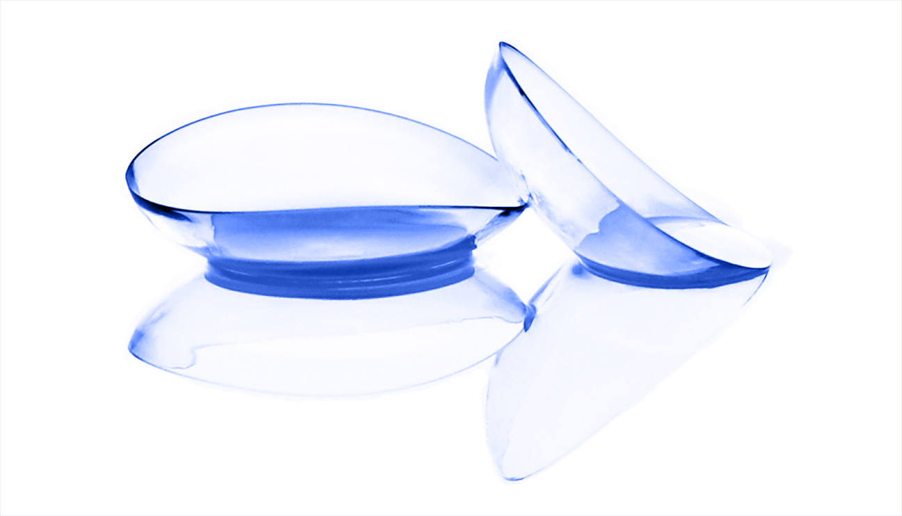 Contact lenses on light blue background. Eyewear, eyesight, eye care and health, ophthalmology and optometry. Close up
